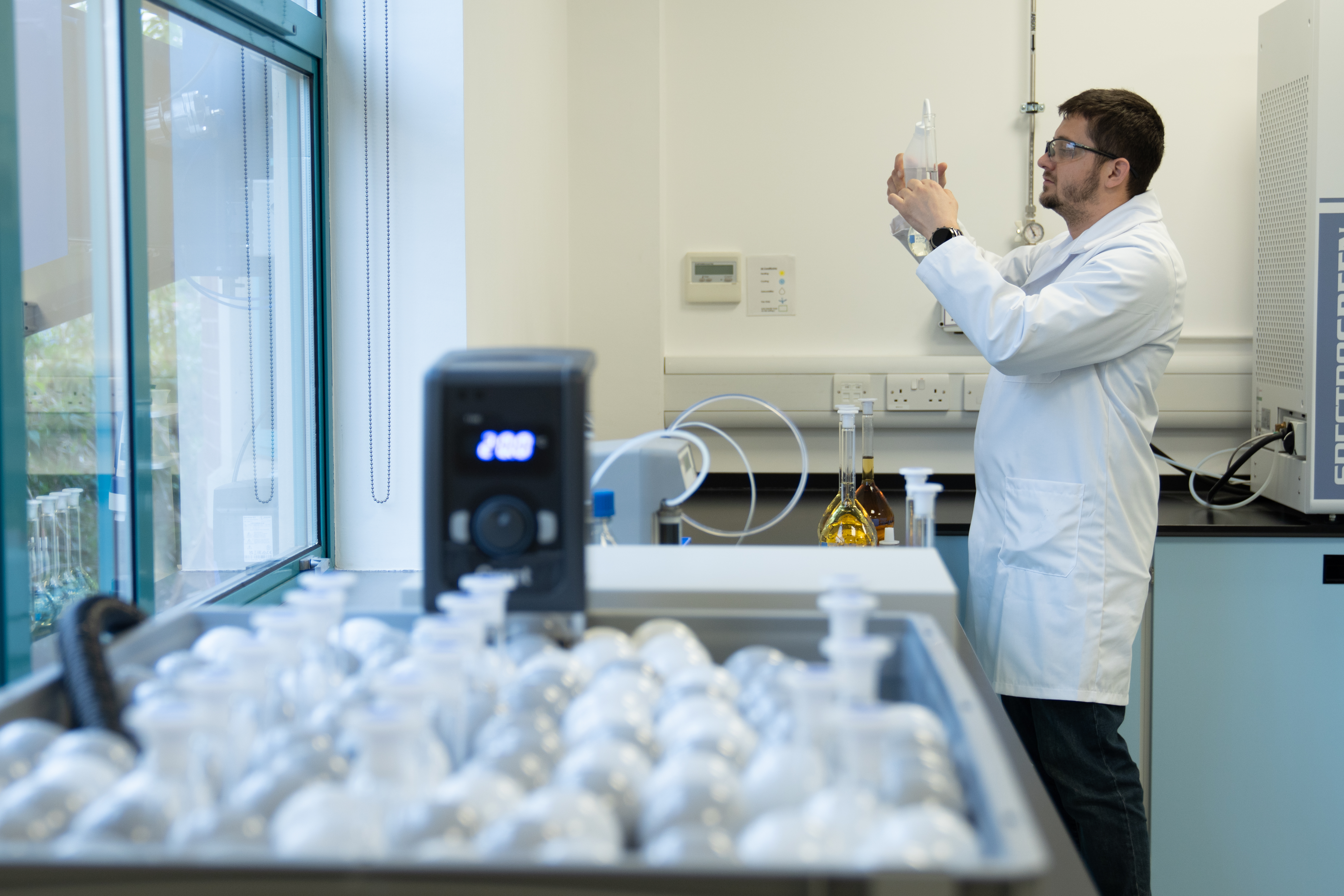 Man holding sample in Mastermelt's technical centre lab